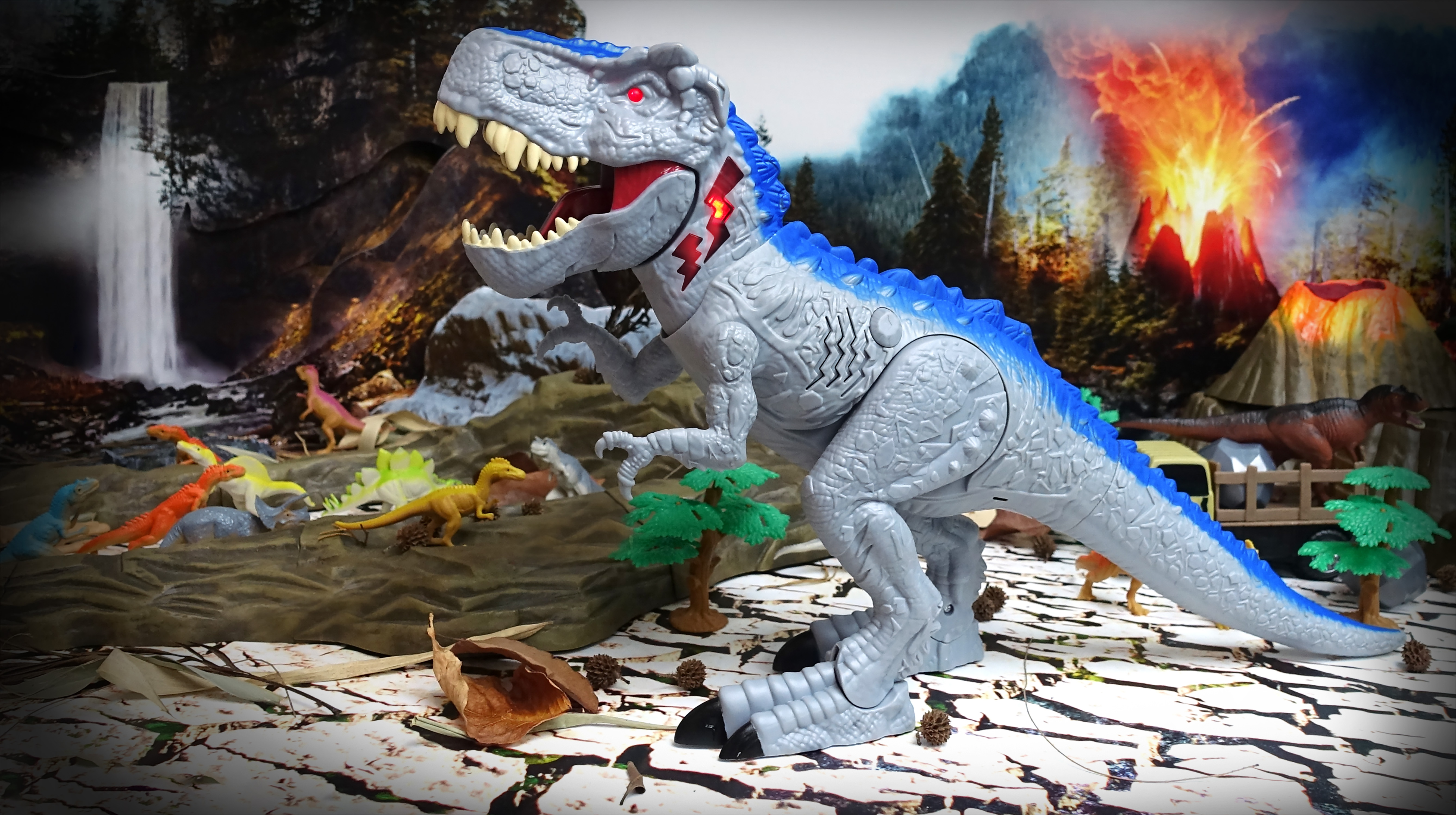 Interaktywny dinozaur szaro-niebieski z dźwiękiem i światłem dla dzieci 3+ - obrazek 4